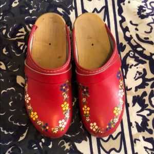Red painted clogs from sweeden